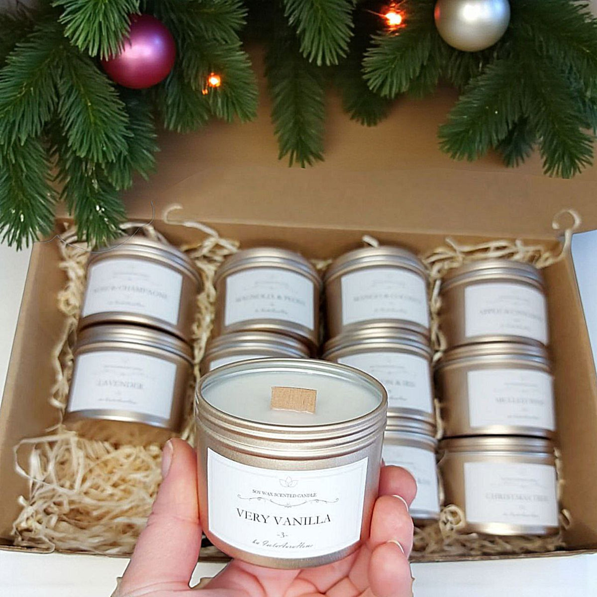 Open 12-day candle advent calendar with handmade soy candles and wooden wicks