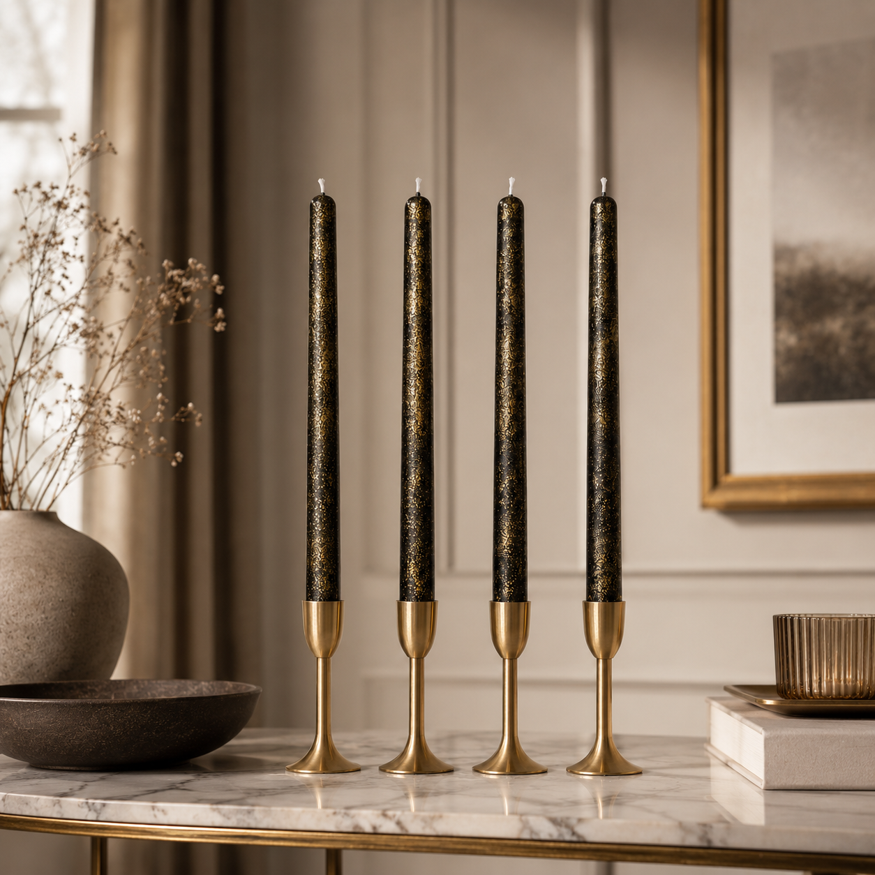 Black and gold dinner candles styled in elegant gold holders for modern home decor