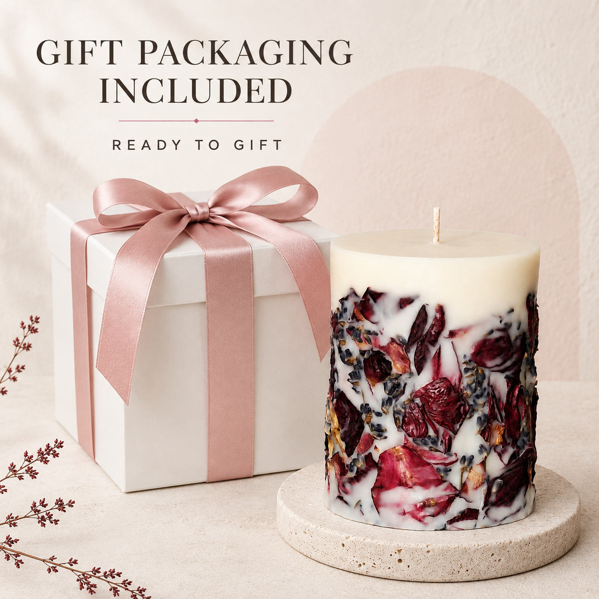 Ivory botanical candle beside a matte white gift box tied with a dusty pink satin ribbon, with the text Gift Packaging Included and Ready to Gift.