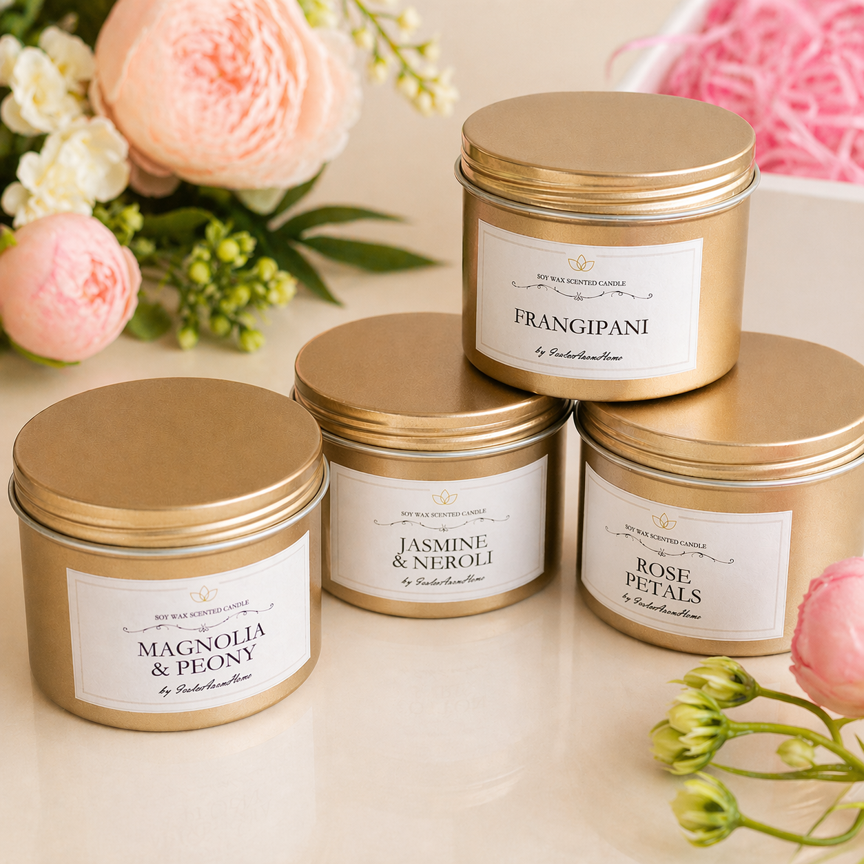 Mini floral scented soy candles in gold tins by Isola Aura Home