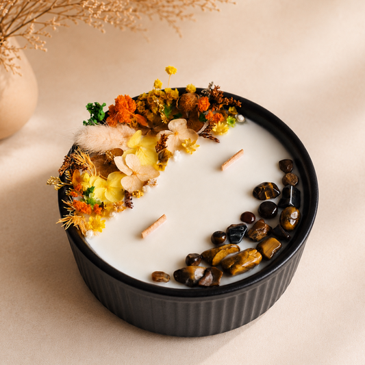 Golden Bloom and Tiger’s Eye floral crystal candle with dried flowers and two wooden wicks, handmade by Isola Candles in Belgium