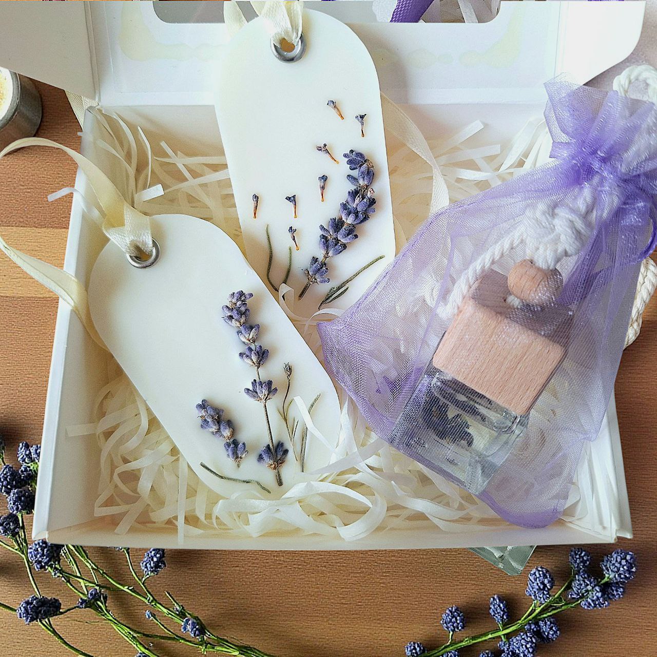 Lavender gift box with two handmade wax sachets and one essential oil car diffuser
