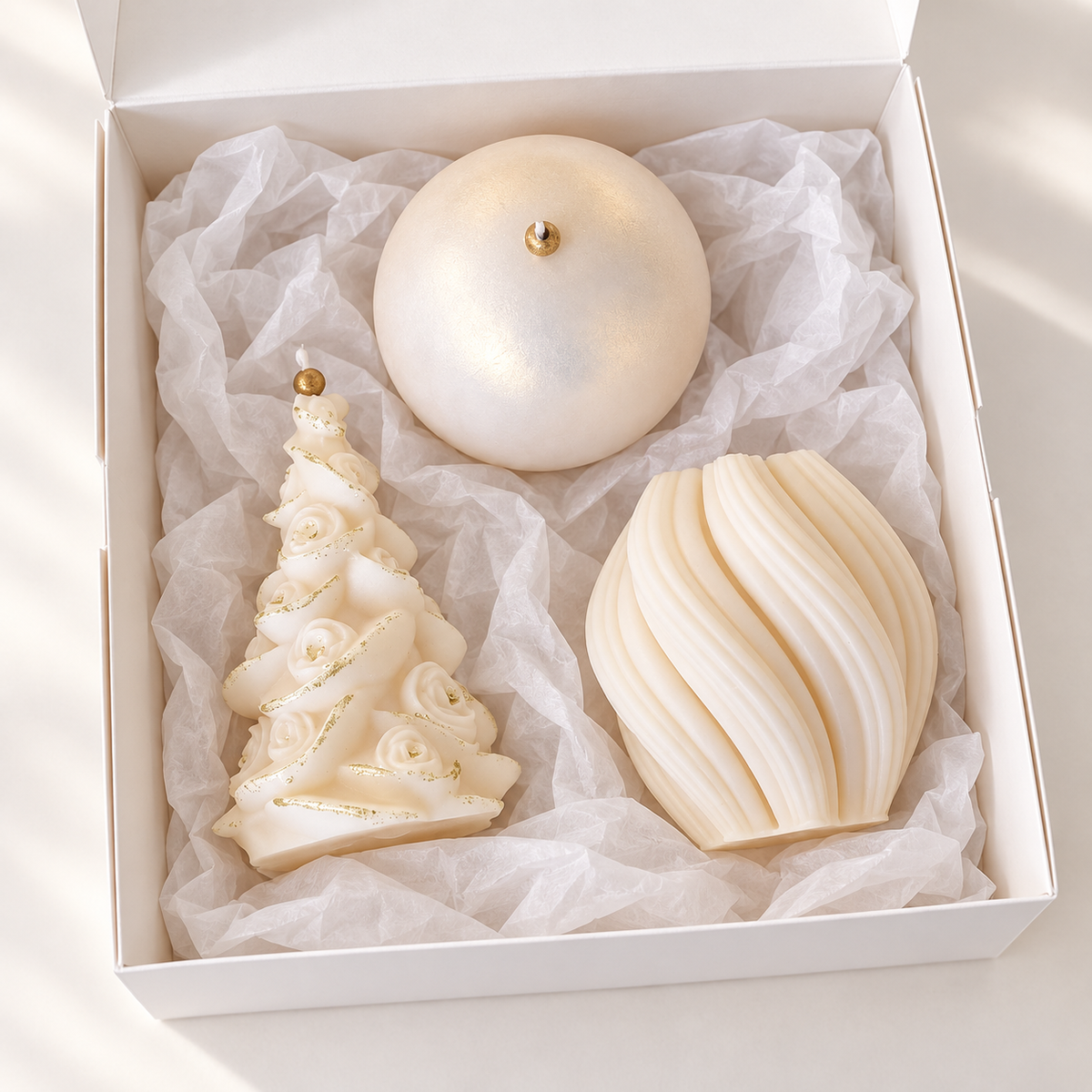 Luxury Christmas candle gift set with floral tree, spiral and pearlescent sphere soy candles in a white gift box
