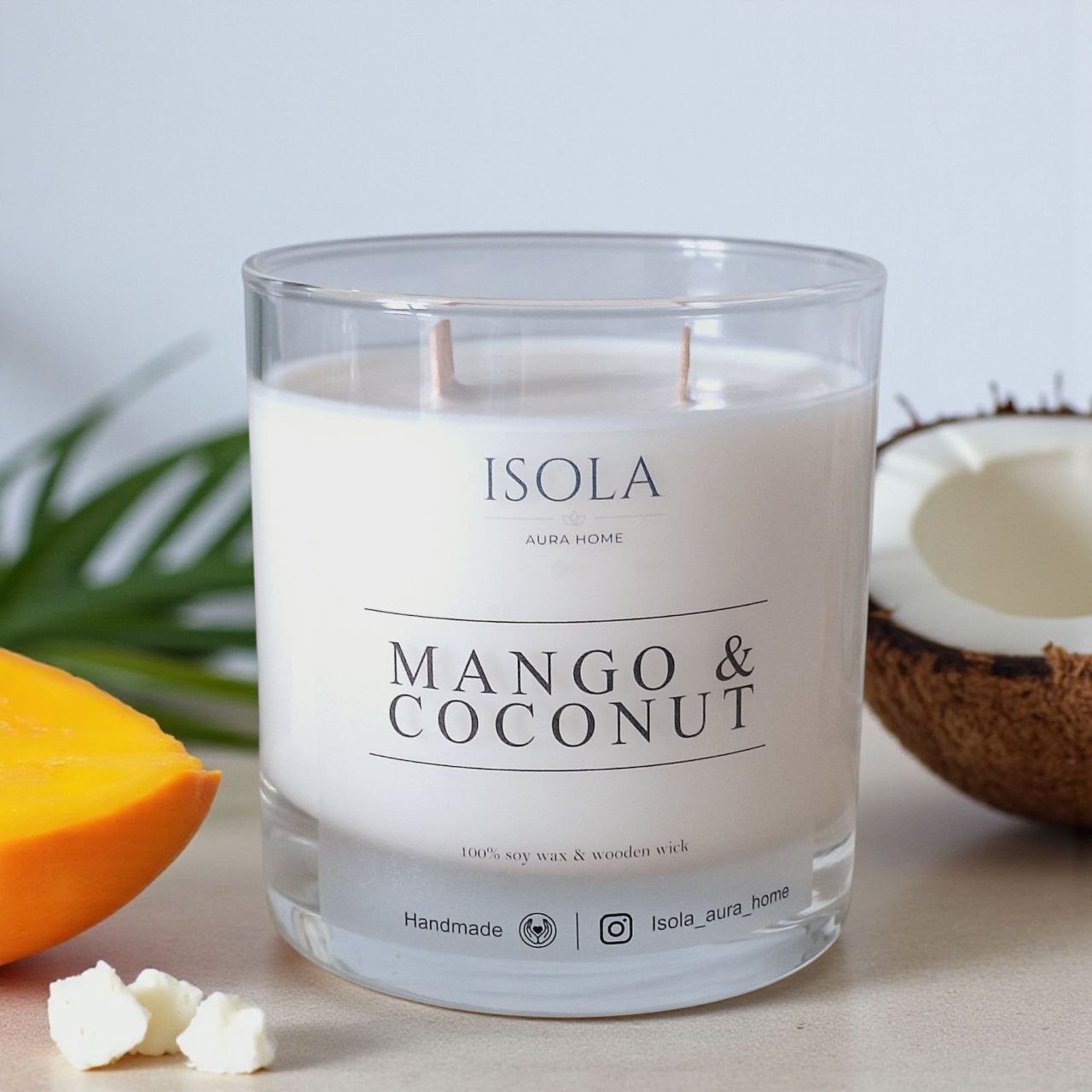 Mango and Coconut soy wax candle in a glass jar with wooden wick, handmade by Isola Aura Home in Belgium