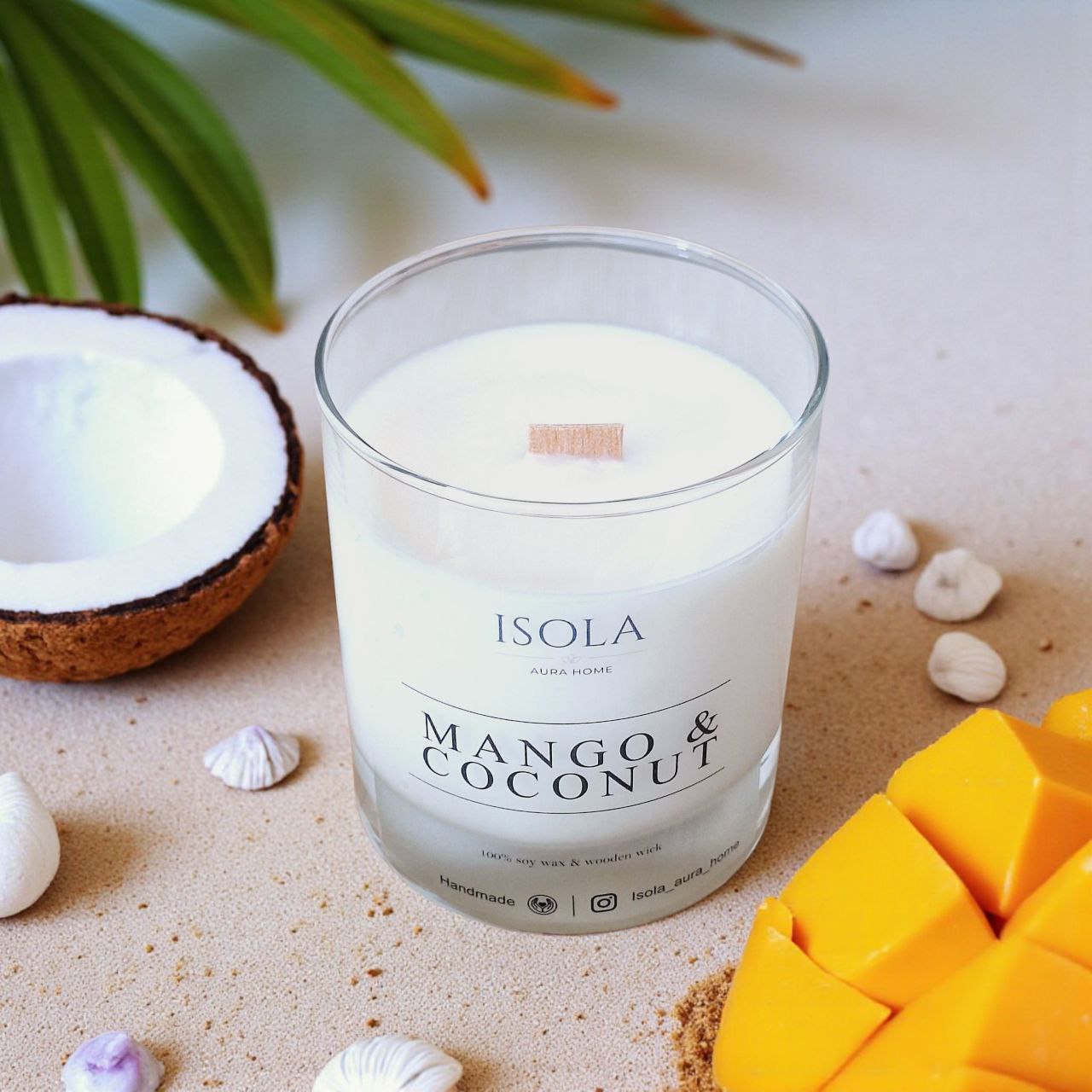 Mango and Coconut soy wax candle in a glass jar with wooden wick and tropical decor, handmade by Isola Aura Home in Belgium