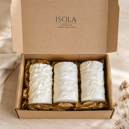 Pearlescent floral soy candle gift set of three presented in a branded kraft box with elegant gold tissue paper. Handmade in Belgium by Isola Aura Home