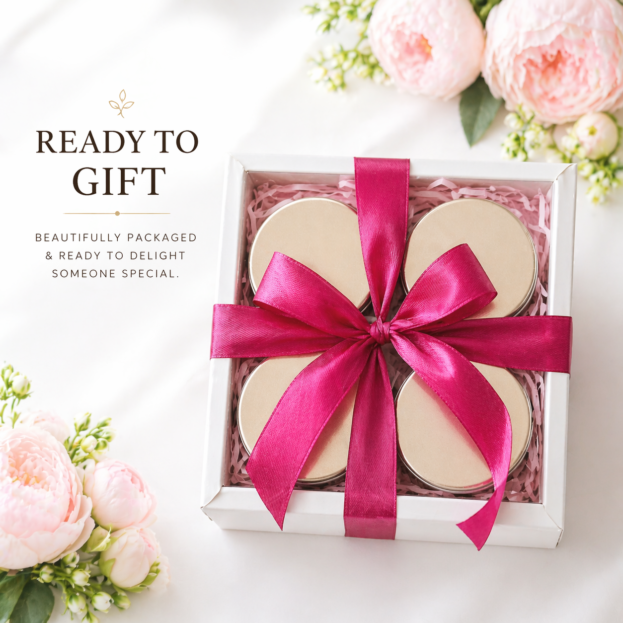 Ready to gift floral candle gift box with four soy candles and pink satin ribbon