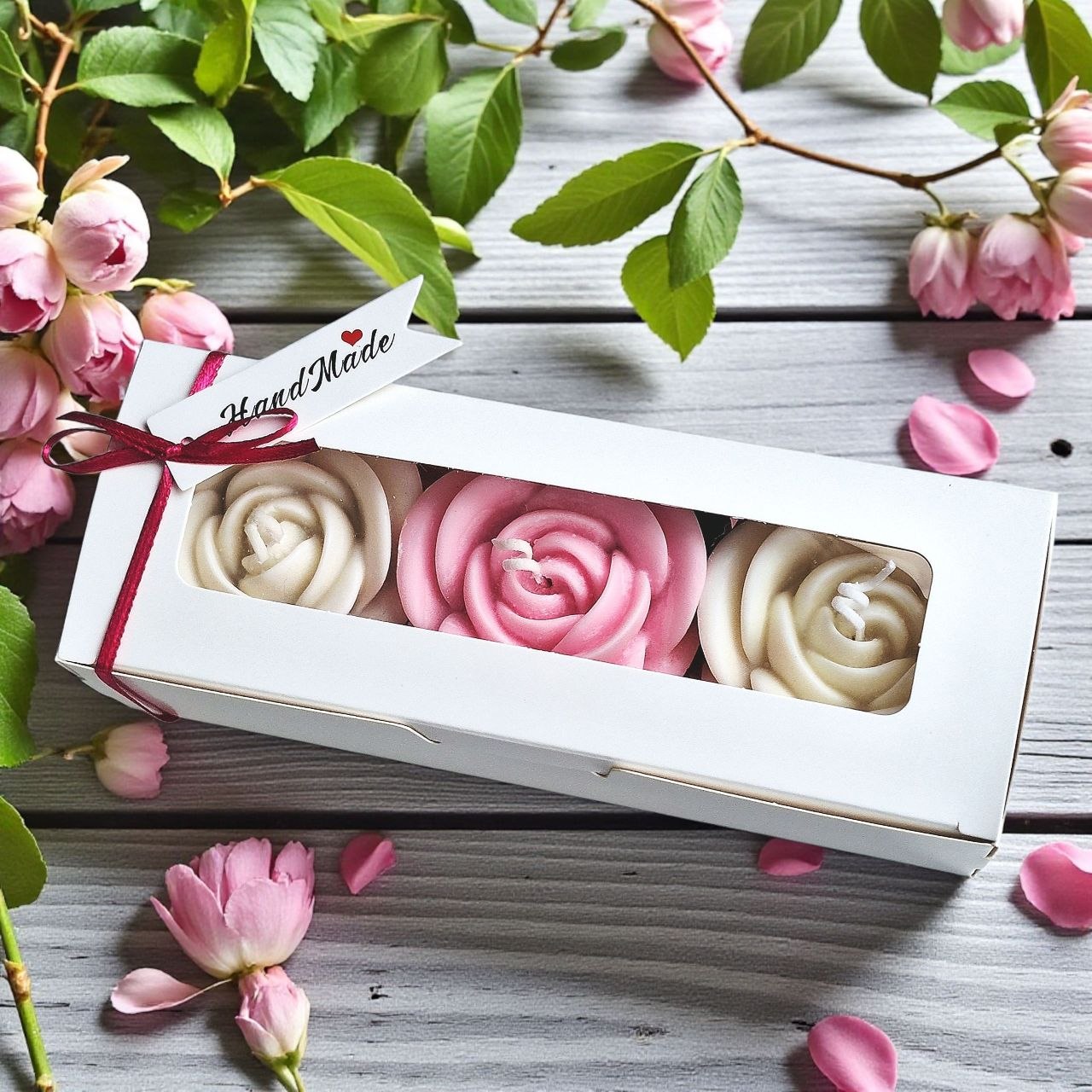 Ready to gift rose candle box with three rose-shaped soy wax candles and ribbon