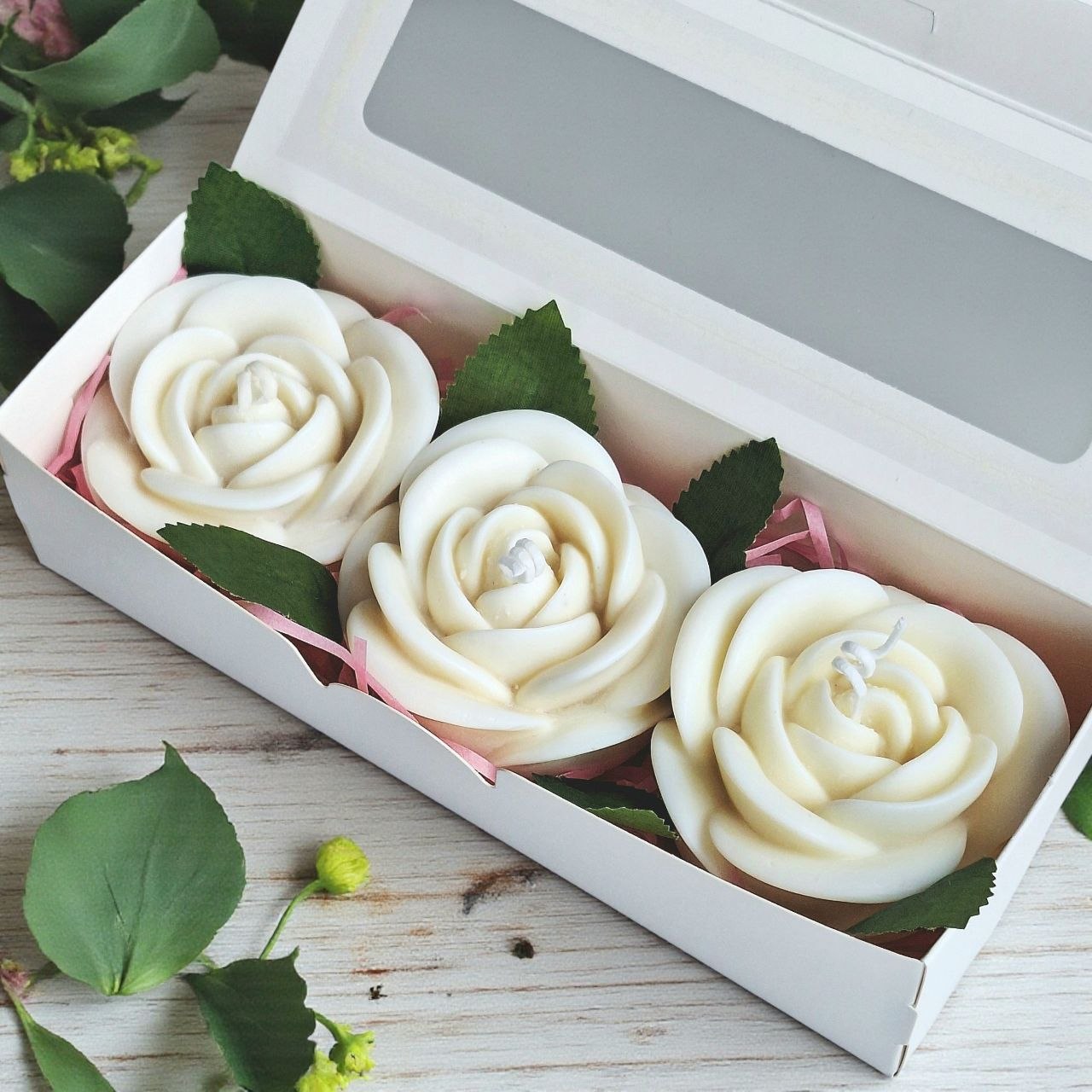 Rose candle gift box with three white soy wax rose candles in a white window box