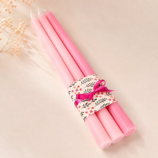 Rose scented pink taper candle set of 3 with floral ribbon, handmade by Isola Aura Home in Belgium