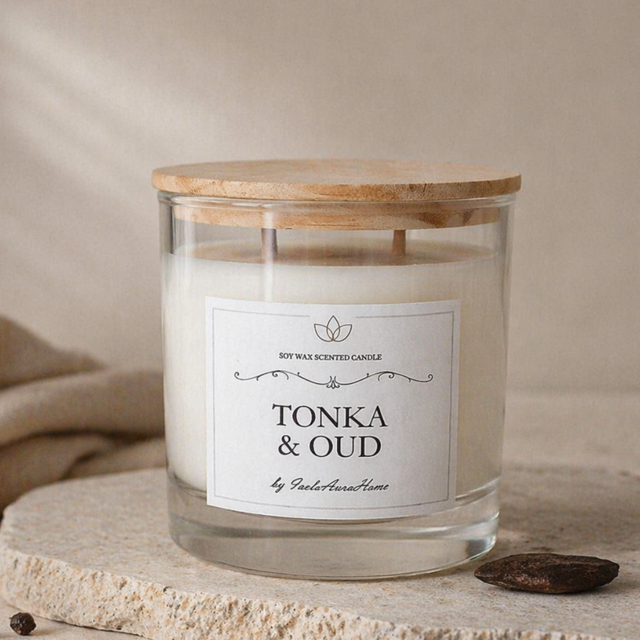 Tonka and Oud soy wax candle in a glass jar with wooden lid, handmade by Isola Aura Home in Belgium