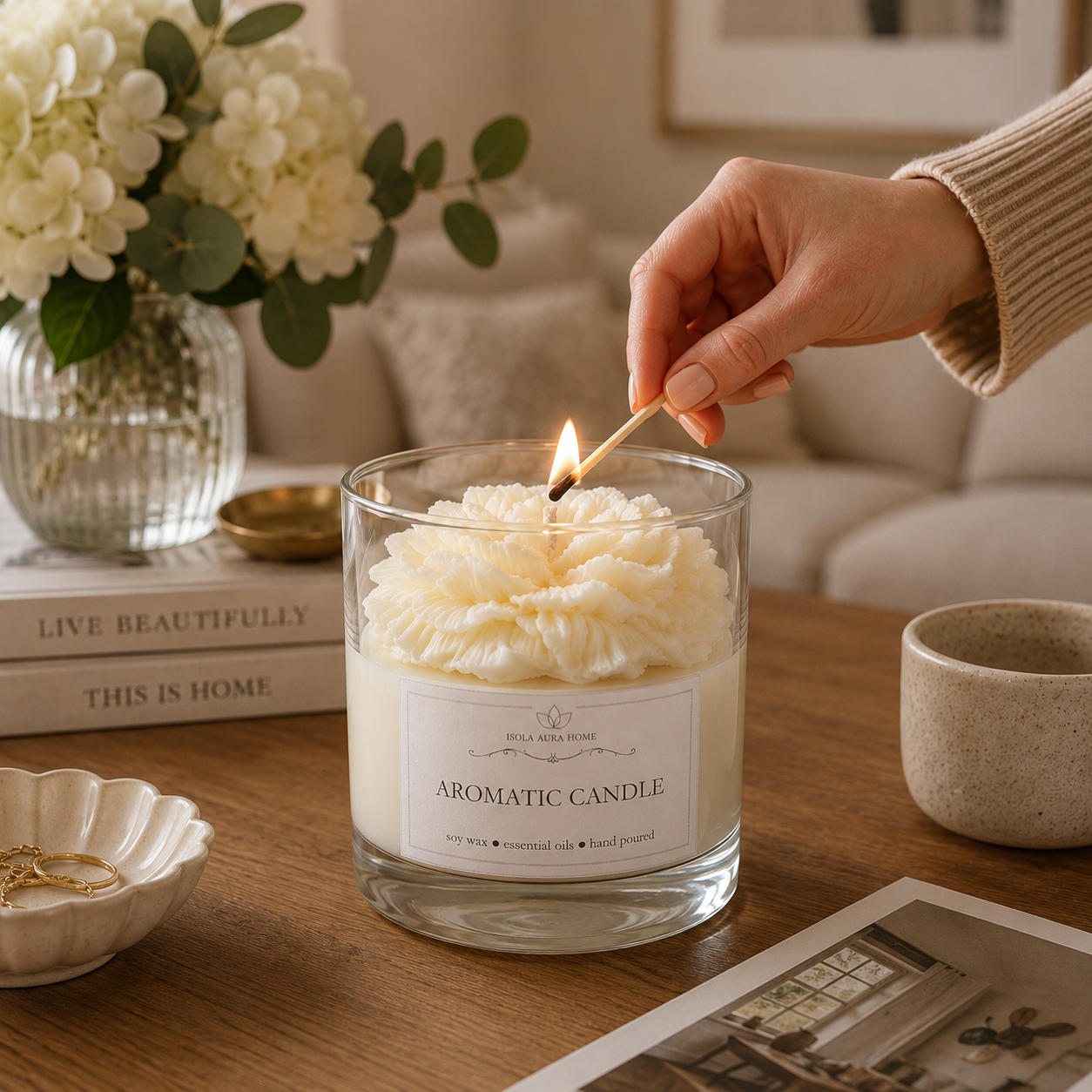 White peony flower-shaped candle being lit for a cosy home fragrance ritual